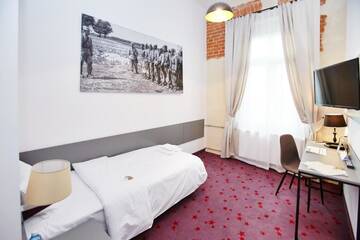 Фото номера Одноместный номер Отель Koszary Arche Hotel г. Гура-Кальвария 15